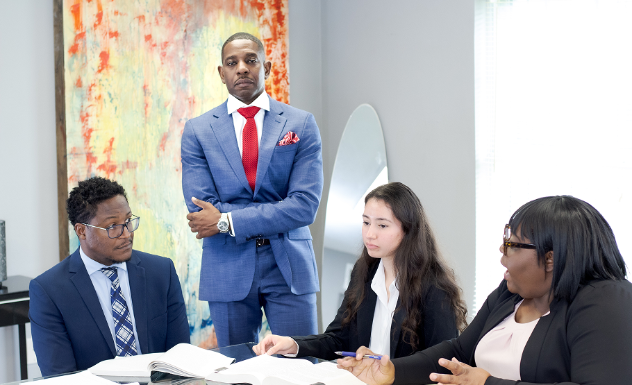 Attorney Ezekiel Tyson Jr. of The Tyson Law Firm in a professional office setting.